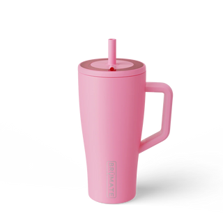 Pink tumbler with a straw on a white background