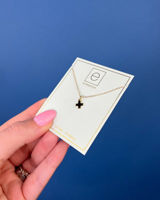 Enewton Signature Gold Cross Charm Necklace featuring a polished gold cross pendant on a delicate 16-inch gold chain displaye