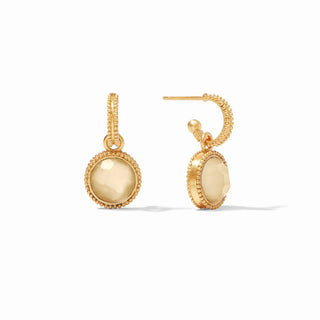 Gold earrings on a white background