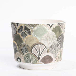 Decorative pot with geometric pattern on a white background