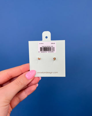 eNewton Classic Gold Ball Stud Earrings featuring polished gold-filled ball studs with secure post backs, minimalist everyday earrings shown on a jewelry card and worn in an ear piercing.