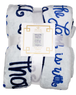 Royal Standard Hail Mary Throw Blanket held up against a store background. 