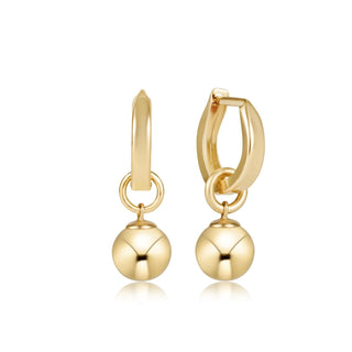 Shop the Enewton Huggie Hoop Gold Charm Earrings featuring polished gold hoops and dangling gold ball charms for timeless everyday style.