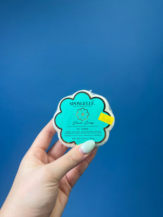 Spongellé Daisy Spongettes travel-sized body wash infused buffer available in multiple fragrances, featuring a flower-shaped cleansing sponge with gentle exfoliation and 7+ uses.