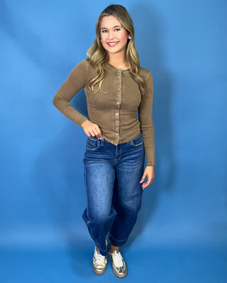 soft cotton ribbed knit, functional button-front detail, flattering fitted silhouette, and comfortable stretch.