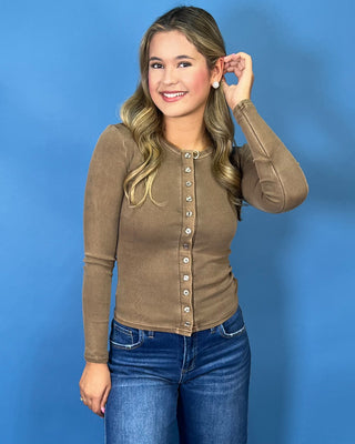 soft cotton ribbed knit, functional button-front detail, flattering fitted silhouette, and comfortable stretch.