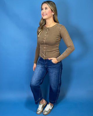 soft cotton ribbed knit, functional button-front detail, flattering fitted silhouette, and comfortable stretch.