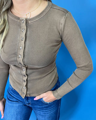 soft cotton ribbed knit, functional button-front detail, flattering fitted silhouette, and comfortable stretch.