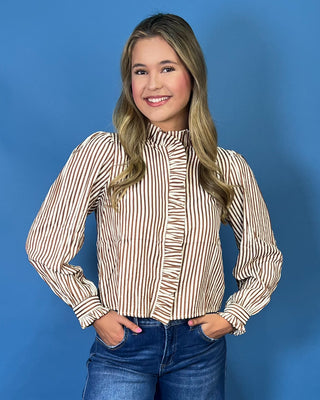 chestnut and ivory stripes, feminine ruffle details, a functional button front, and lightweight woven fabric