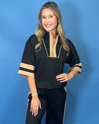 quarter zip top, wide leg pants, camel contrast trim, side pockets, elastic drawstring waist, and soft stretch fabric