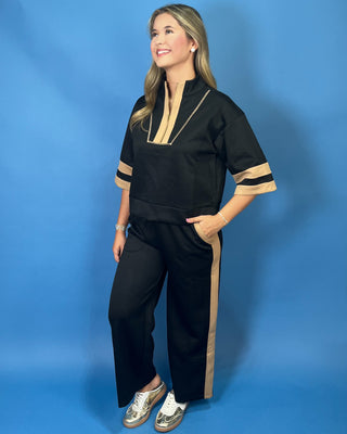 quarter zip top, wide leg pants, camel contrast trim, side pockets, elastic drawstring waist, and soft stretch fabric