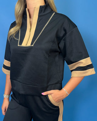 quarter zip top, wide leg pants, camel contrast trim, side pockets, elastic drawstring waist, and soft stretch fabric