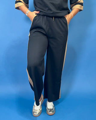 quarter zip top, wide leg pants, camel contrast trim, side pockets, elastic drawstring waist, and soft stretch fabric