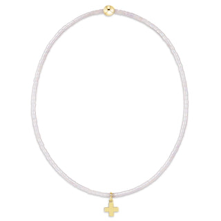 Necklace with gold beads and cross on a white background