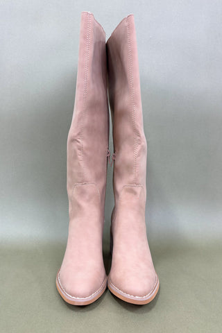 Pair of pink knee-high boots on a gray background