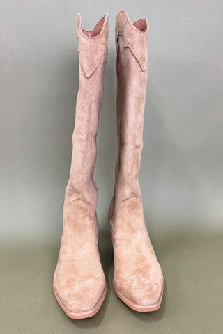 Pair of pink knee-high boots on a gray background