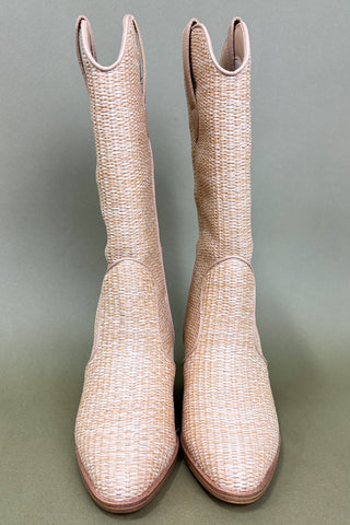 Pair of beige woven boots on a gray background
