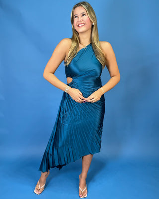 Teal satin one-shoulder midi dress with pleated detailing, ruched waist, side cutout, and asymmetrical hem.