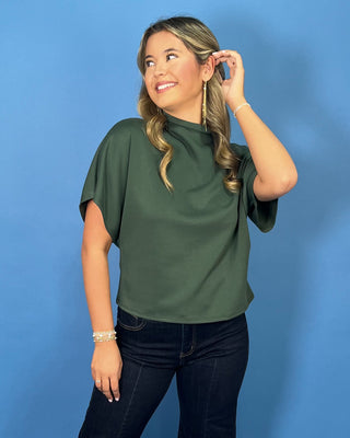 Hunter green mock neck top with relaxed short sleeves and a smooth, polished finish.