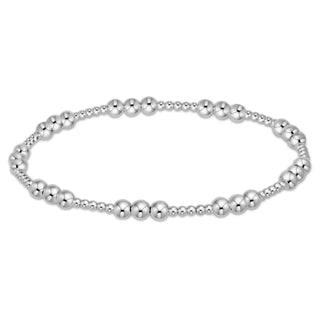 Silver beaded bracelet on a white background