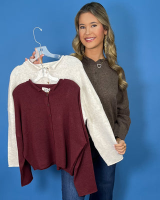 Brown heathered knit button-front cardigan with a collared neckline, long sleeves, relaxed fit, and cropped hem.
