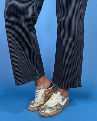 Dark wash pinstripe straight leg jeans with front patch pockets and a high-rise waist, shown on model.