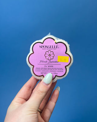 Spongellé Daisy Spongettes travel-sized body wash infused buffer available in multiple fragrances, featuring a flower-shaped cleansing sponge with gentle exfoliation and 7+ uses.
