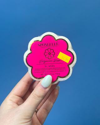 Spongellé Daisy Spongettes travel-sized body wash infused buffer available in multiple fragrances, featuring a flower-shaped cleansing sponge with gentle exfoliation and 7+ uses.
