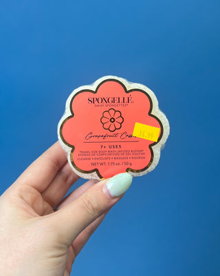 Spongellé Daisy Spongettes travel-sized body wash infused buffer available in multiple fragrances, featuring a flower-shaped cleansing sponge with gentle exfoliation and 7+ uses.