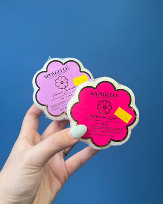 Spongellé Daisy Spongettes travel-sized body wash infused buffer available in multiple fragrances, featuring a flower-shaped cleansing sponge with gentle exfoliation and 7+ uses.