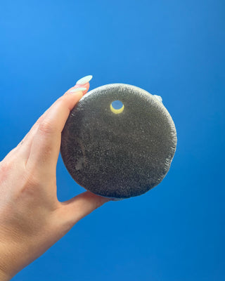 Spongellé Men's Super Buffer body wash infused sponge in Verbena Absolute featuring a dual-sided exfoliating scrubber, built-in body wash, and long-lasting formula with 28+ washes.
