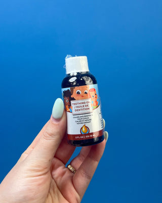 Punkin Butt Natural Teething Oil available in 1 oz and 2 oz dropper bottles for babies, featuring a naturally derived formula designed to help soothe teething discomfort.