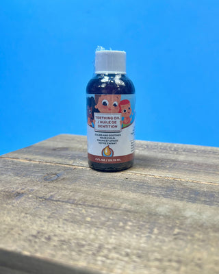 Punkin Butt Natural Teething Oil available in 1 oz and 2 oz dropper bottles for babies, featuring a naturally derived formula designed to help soothe teething discomfort.