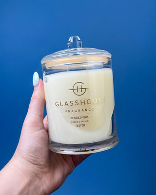 Glasshouse Fragrances 380g luxury soy candle collection featuring Lost in Amalfi, Sunsets in Capri, Kyoto in Bloom, Rendezvous, and Velvet Rhapsody candles in colorful designer gift boxes with premium glass candle vessels.