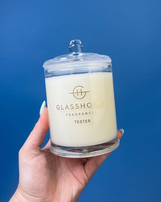 Glasshouse Fragrances 380g luxury soy candle collection featuring Lost in Amalfi, Sunsets in Capri, Kyoto in Bloom, Rendezvous, and Velvet Rhapsody candles in colorful designer gift boxes with premium glass candle vessels.