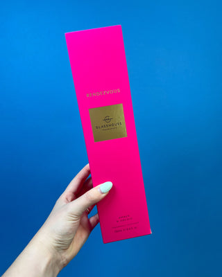 Glasshouse Fragrances 250mL reed diffuser collection featuring luxury home fragrance diffusers in Lost in Amalfi, Sunsets in Capri, Midnight in Milan, Kyoto in Bloom, Velvet Rhapsody, and Rendezvous scents with colorful signature packaging.