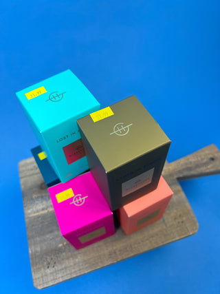 Glasshouse Fragrances 2.1 oz mini soy candle collection featuring luxury glass candles in multiple signature scents including Lost in Amalfi, Kyoto in Bloom, Rendezvous, Velvet Rhapsody, and Sunsets in Capri.