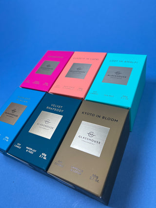 Glasshouse Fragrances 2.1 oz mini soy candle collection featuring luxury glass candles in multiple signature scents including Lost in Amalfi, Kyoto in Bloom, Rendezvous, Velvet Rhapsody, and Sunsets in Capri.
