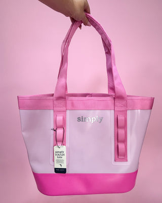 Pink and white tote bag with 'simply' branding on a pink background