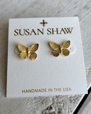 Gold butterfly earrings on a Susan Shaw branded card with 'Handmade in the USA' text.