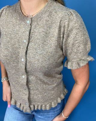 Taupe Short Sleeve Knit Ruffle Button Cardigan featuring pearl-style buttons, ruffle trim, soft stretch knit