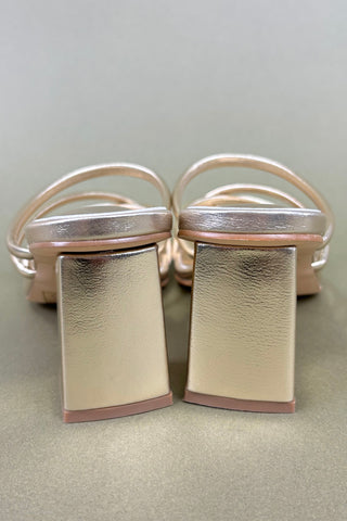 Pair of silver earrings on a light gray background