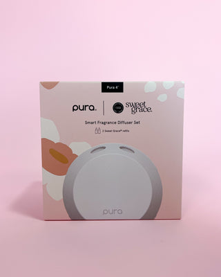 Pura smart fragrance diffuser set packaging on a pink background