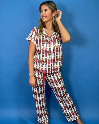 Simply Southern holiday nutcracker pajama set with button-front top, matching drawstring pants, and festive Christmas print.