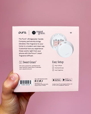 Product packaging with text and branding on a pink background