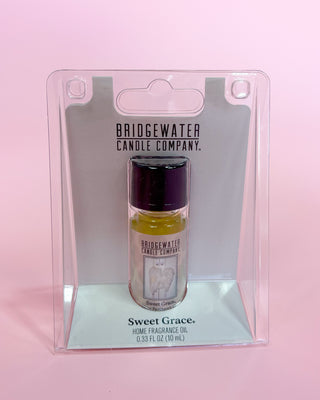 Bridgewater Candle Company Sweet Grace fragrance oil packaging on a pink background