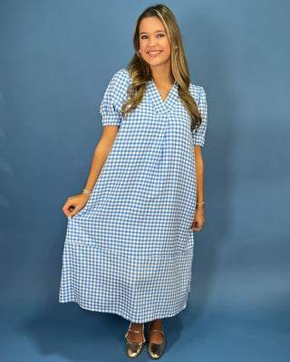 g a blue and white gingham midi dress with short puff sleeves, a V-neck, and side pockets