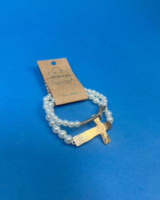 Two-piece gold cross and faux pearl stretch bracelet set featuring hammered and polished gold cross accents on white pearl bead bracelets.