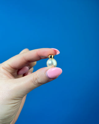 Carmen gold-tone stud earrings featuring oversized faux pearl drops, lightweight classic statement earrings perfect for weddings, formal occasions, work, church, and everyday elegant styling.