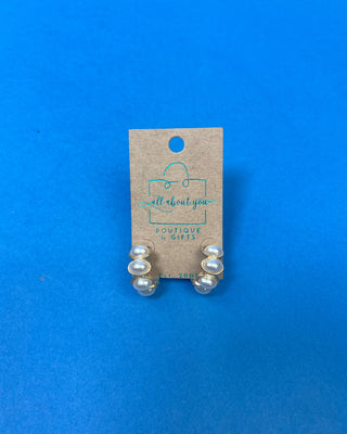 Elegant Aria Pearl Hoop Earrings featuring polished gold-tone hoops with luminous faux pearl accents, lightweight post-back earrings perfect for weddings, office wear, church, and everyday classic style.